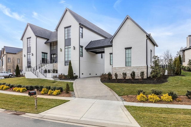 view of front of property with a front lawn