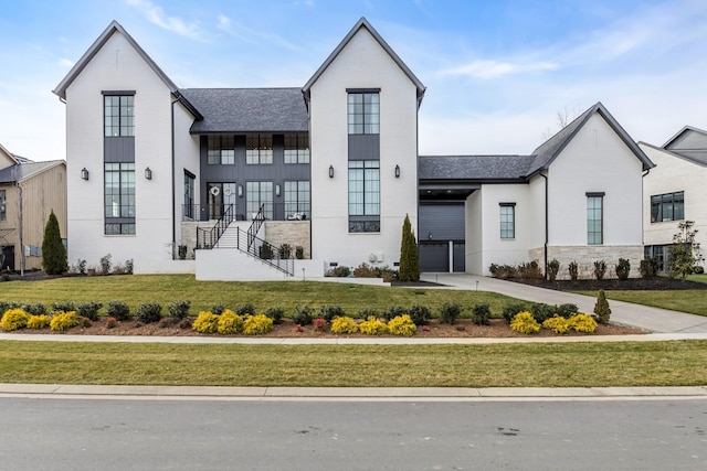 view of front facade featuring a carport and a front yard