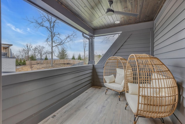 balcony featuring ceiling fan