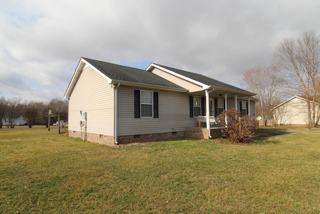 view of front of home featuring a front yard and a porch