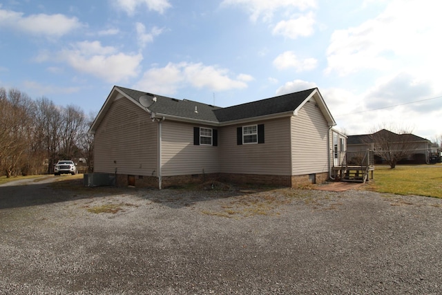 view of property exterior with central AC