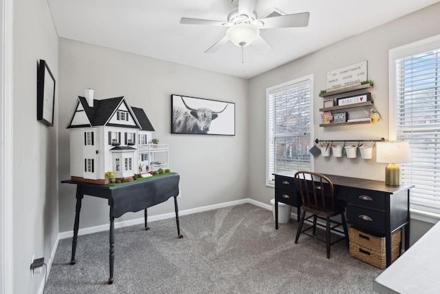 office space featuring carpet floors and ceiling fan