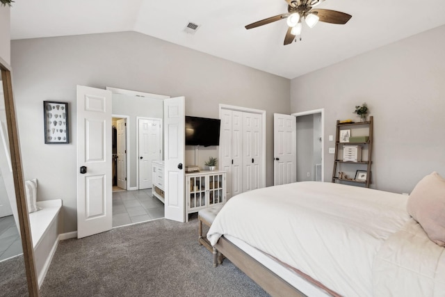 carpeted bedroom featuring ceiling fan and lofted ceiling