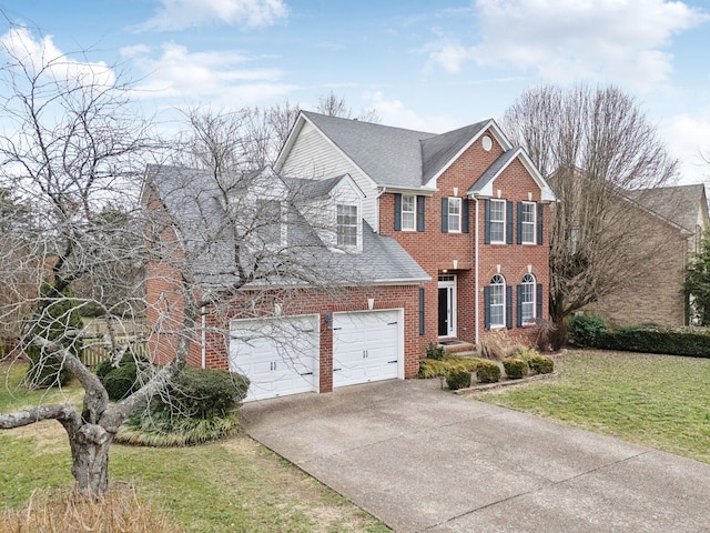 view of front facade with a garage and a front yard