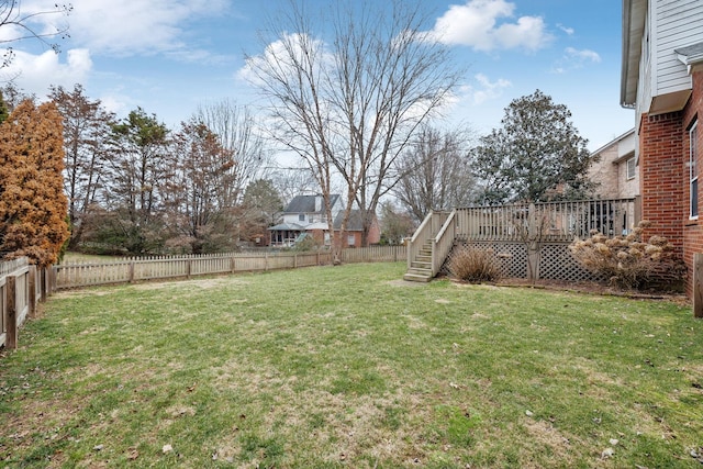 view of yard featuring a wooden deck