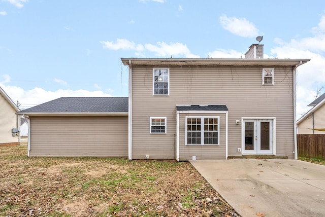 back of property featuring a patio and french doors