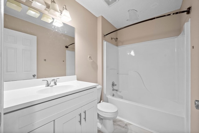 full bathroom featuring shower / bath combination, vanity, a textured ceiling, and toilet