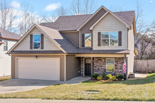 view of front of home with a garage and a front yard