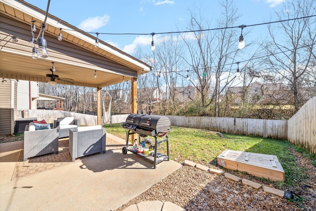 view of patio featuring area for grilling, outdoor lounge area, and ceiling fan