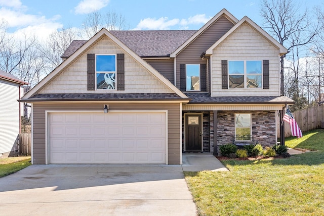 craftsman-style home with a garage and a front yard