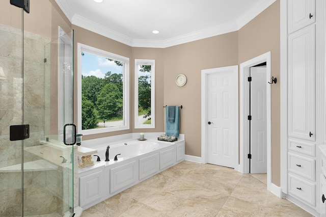 bathroom featuring independent shower and bath and ornamental molding