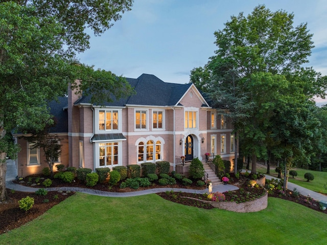 view of front of home with a front yard