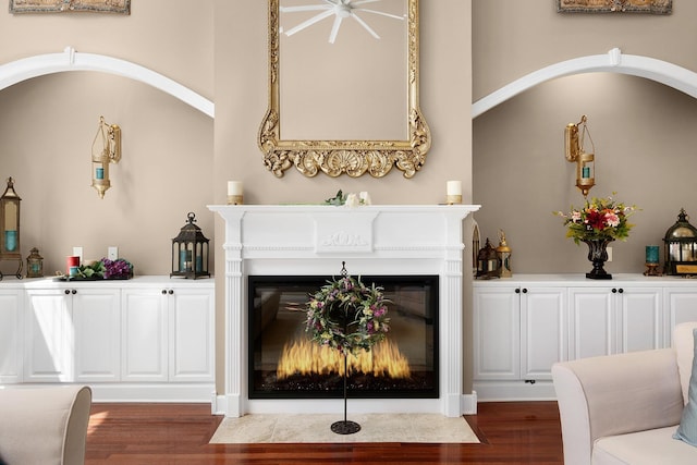 living room with dark hardwood / wood-style floors