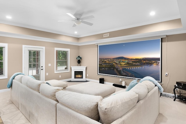 living room featuring ceiling fan and light carpet