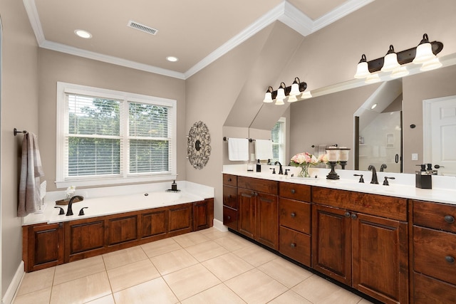 bathroom with vanity, a bathtub, crown molding, and tile patterned floors