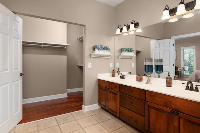 bathroom with vanity and tile patterned floors