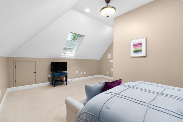 bedroom featuring light colored carpet and lofted ceiling