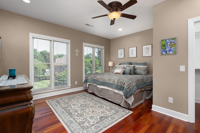 bedroom featuring dark wood-type flooring and ceiling fan