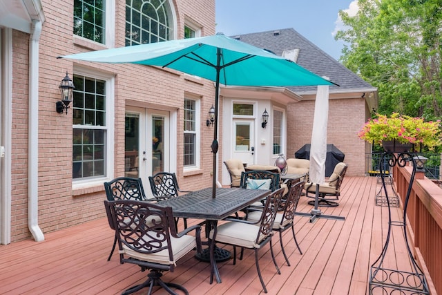 deck with area for grilling and french doors