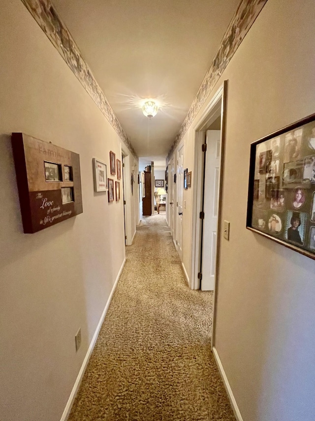 hallway with light carpet