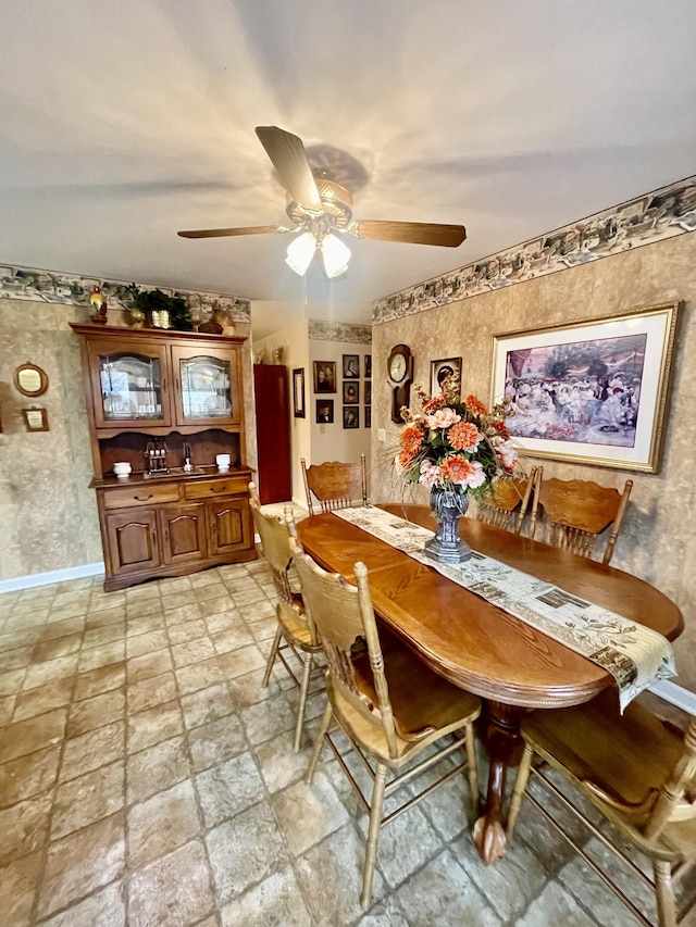 dining area with ceiling fan