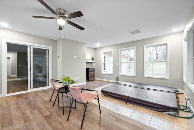 living room with light hardwood / wood-style flooring