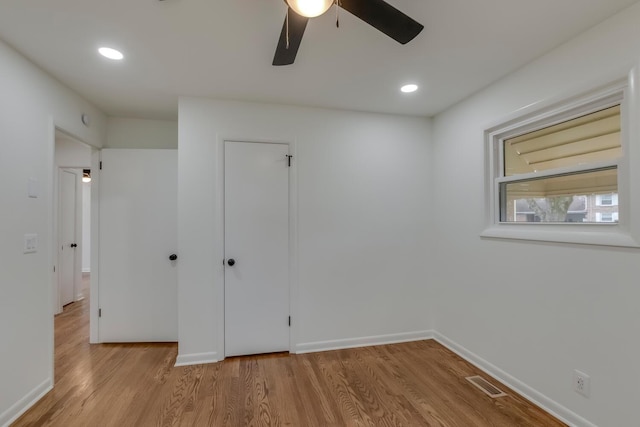 unfurnished bedroom with recessed lighting, baseboards, visible vents, and light wood finished floors