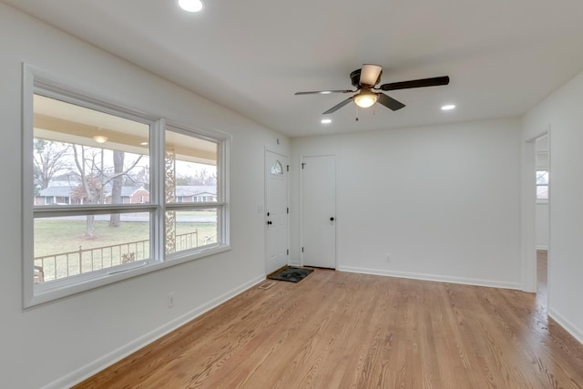 foyer entrance featuring light wood-style floors, recessed lighting, ceiling fan, and baseboards