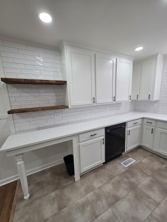 kitchen with visible vents, black dishwasher, light countertops, backsplash, and open shelves