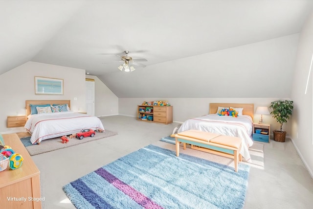 carpeted bedroom with lofted ceiling and ceiling fan