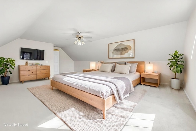 bedroom with lofted ceiling and ceiling fan