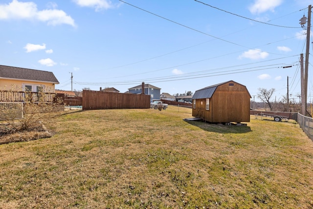 view of yard with a storage shed