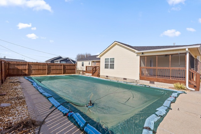 view of pool featuring a sunroom