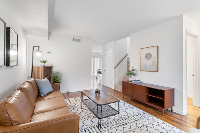 living room with hardwood / wood-style floors