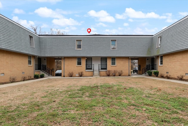 exterior space featuring a front lawn