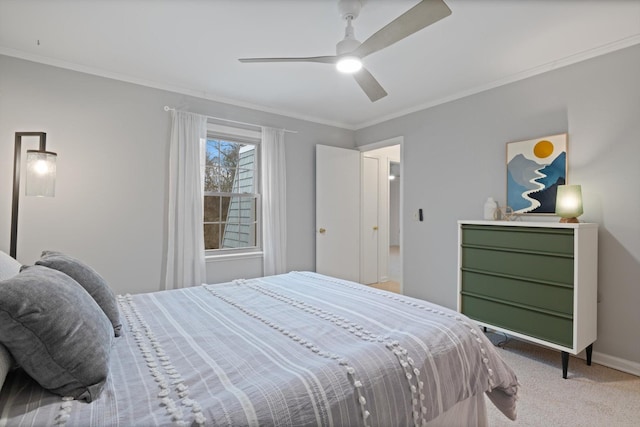 bedroom with crown molding, ceiling fan, and carpet flooring