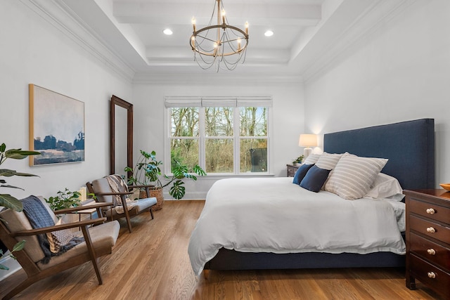 bedroom with beamed ceiling, crown molding, a notable chandelier, and light wood-type flooring