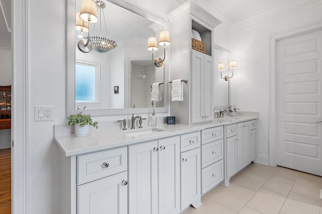 bathroom featuring crown molding, vanity, and tile patterned floors