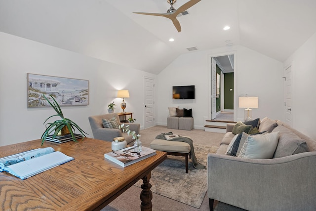 living room with lofted ceiling, carpet floors, and ceiling fan