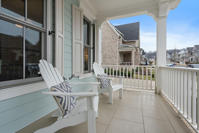 balcony featuring a porch