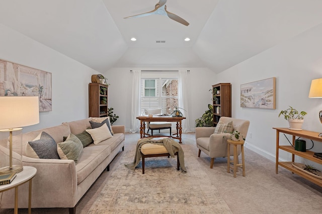 carpeted living room featuring lofted ceiling and ceiling fan