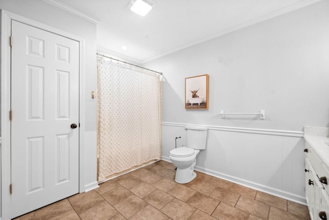 full bathroom featuring vanity, ornamental molding, toilet, and shower / bath combo