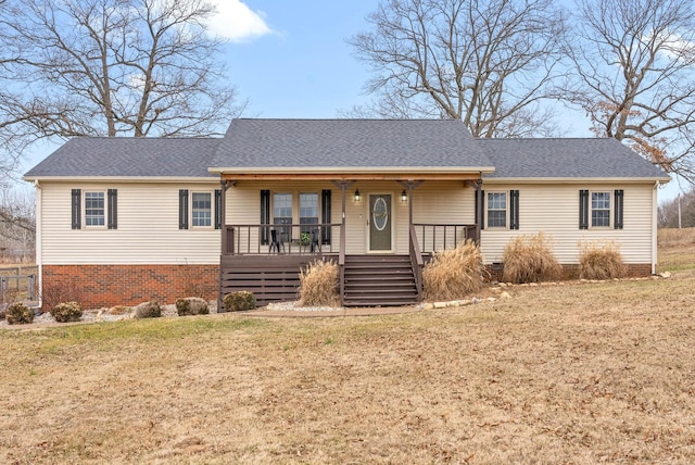 single story home featuring a front lawn and covered porch