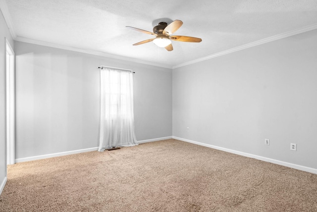 carpeted empty room with crown molding, ceiling fan, and a textured ceiling