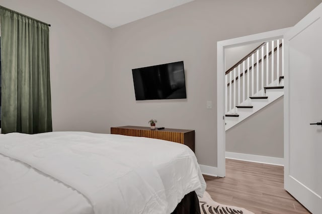 bedroom featuring light hardwood / wood-style flooring