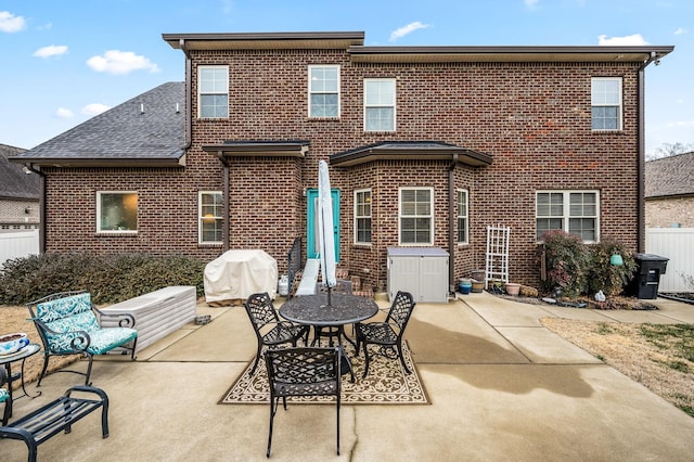 rear view of house with a patio