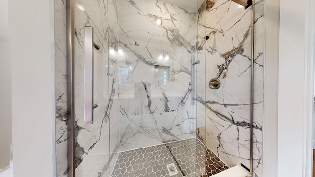 bathroom featuring a tile shower