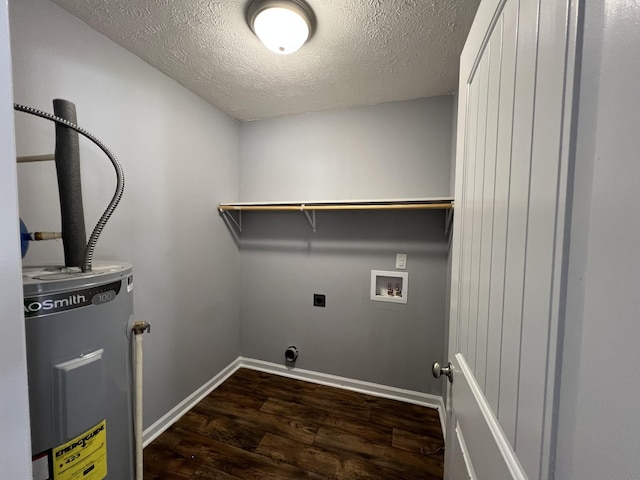 laundry room with electric dryer hookup, electric water heater, washer hookup, a textured ceiling, and dark hardwood / wood-style flooring