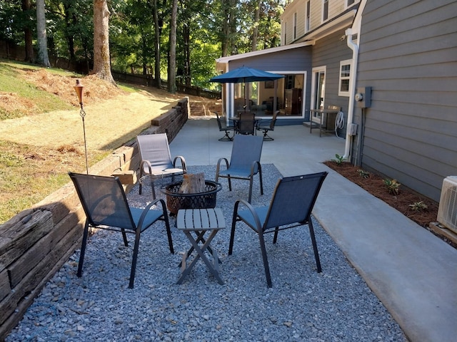 view of patio / terrace featuring a fire pit