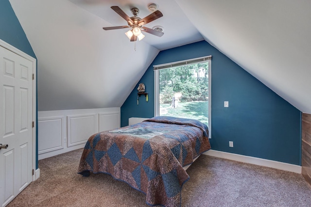 bedroom with carpet, lofted ceiling, and ceiling fan